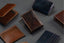 Jekyll and Hide - Leather Money Clip Wallet - Mocha | Black | Camo Black | Tan displayed among various leather wallets.