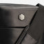 Close-up detail of the Jekyll and Hide - Small Crossbody Organiser - Mocha | Tan | Black in black leather.