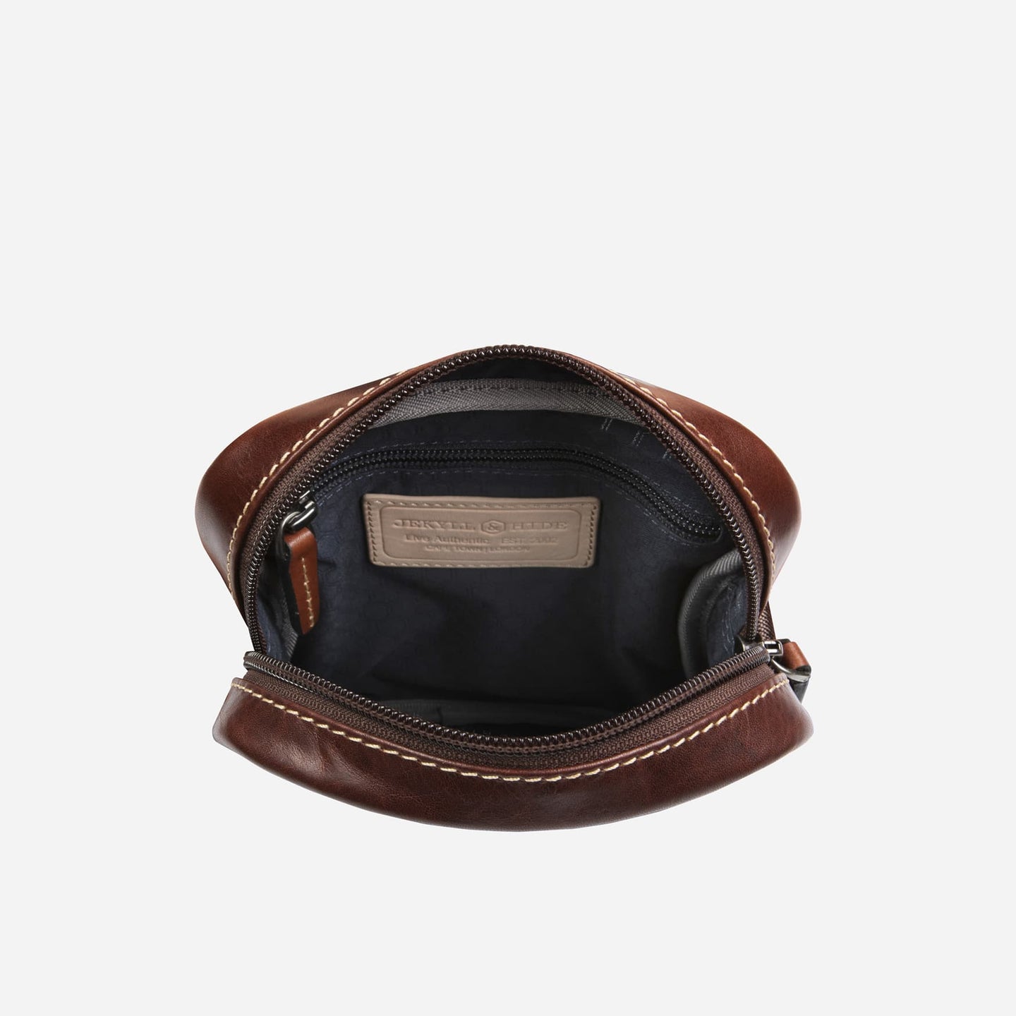 Inside view of Jekyll and Hide - Small Crossbody Organiser - Mocha | Tan | Black showcasing spacious interior.