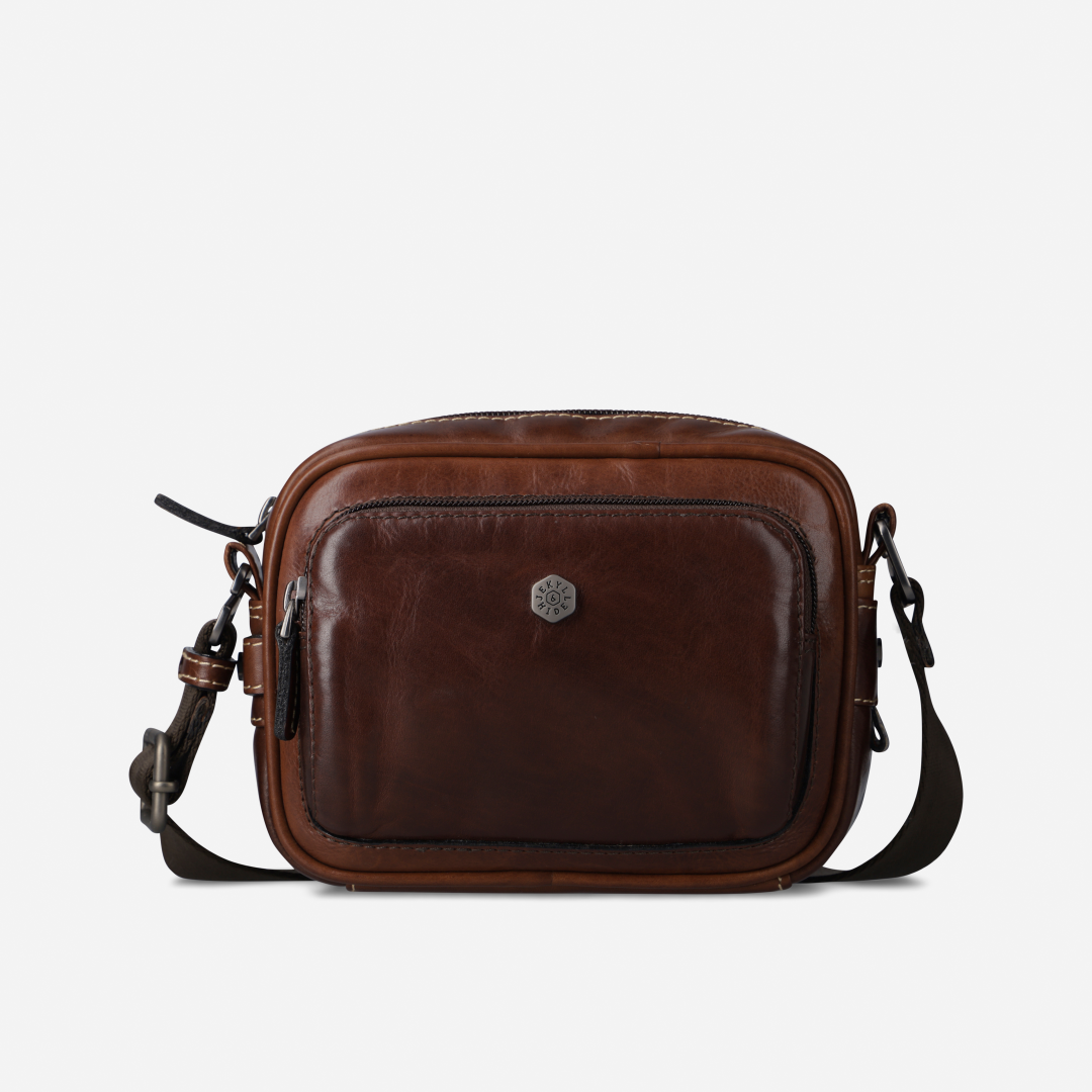 Jekyll and Hide - Small Travel Crossbody Bag - Mocha shown in durable leather, featuring minimalist design and adjustable strap.