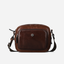Jekyll and Hide - Small Travel Crossbody Bag - Mocha shown in durable leather, featuring minimalist design and adjustable strap.