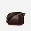 Jekyll and Hide - Small Travel Crossbody Bag - Mocha displayed in mocha leather with adjustable strap and zip compartments.