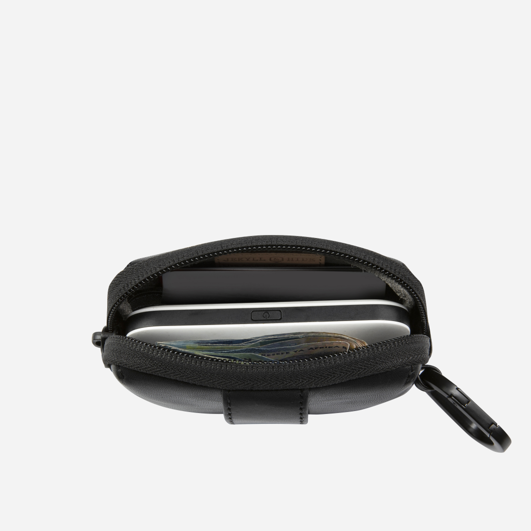 Inside view of Jekyll and Hide - Men's Utility Pouch - Black | Mocha showcasing compartments for essentials.