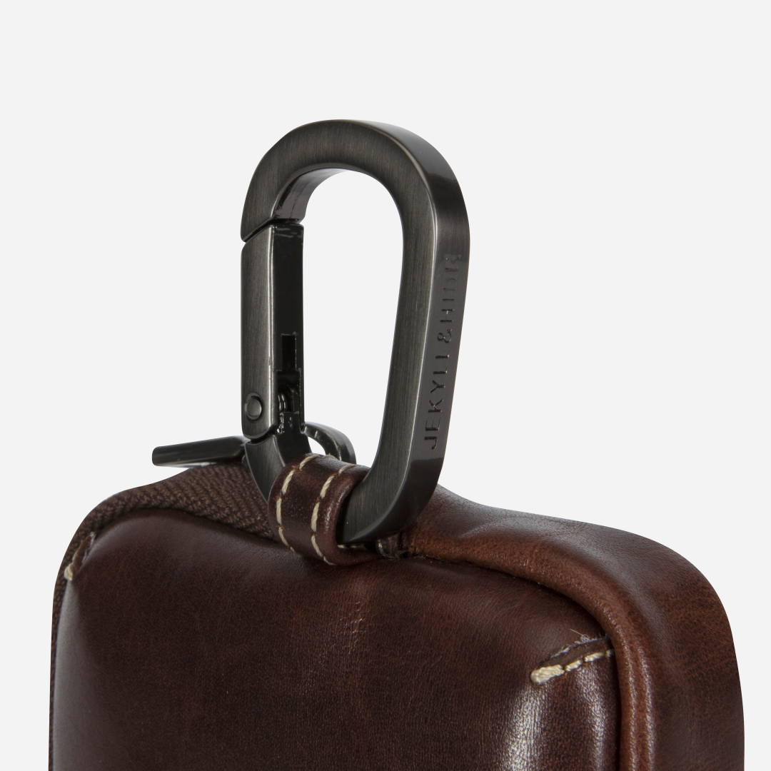 Jekyll and Hide - Men's Utility Pouch - Black | Mocha close-up of carabiner detail on pouch handle.