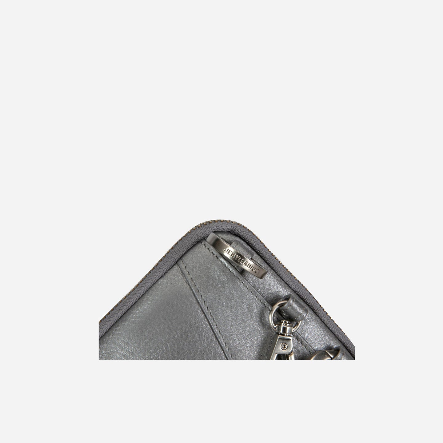 Jekyll and Hide - Mobile Phone Pouch With Strap - Black | Tan | Multiple Colours - close-up view of zipper and leather detailing.