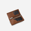 Jekyll and Hide - Large Travel And Mobile Wallet - Tan | Mocha | Black interior showing card slots and zipper compartment.