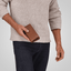 Jekyll and Hide - Large Travel And Mobile Wallet - Tan | Mocha | Black being held in hand, showcasing its sleek design.