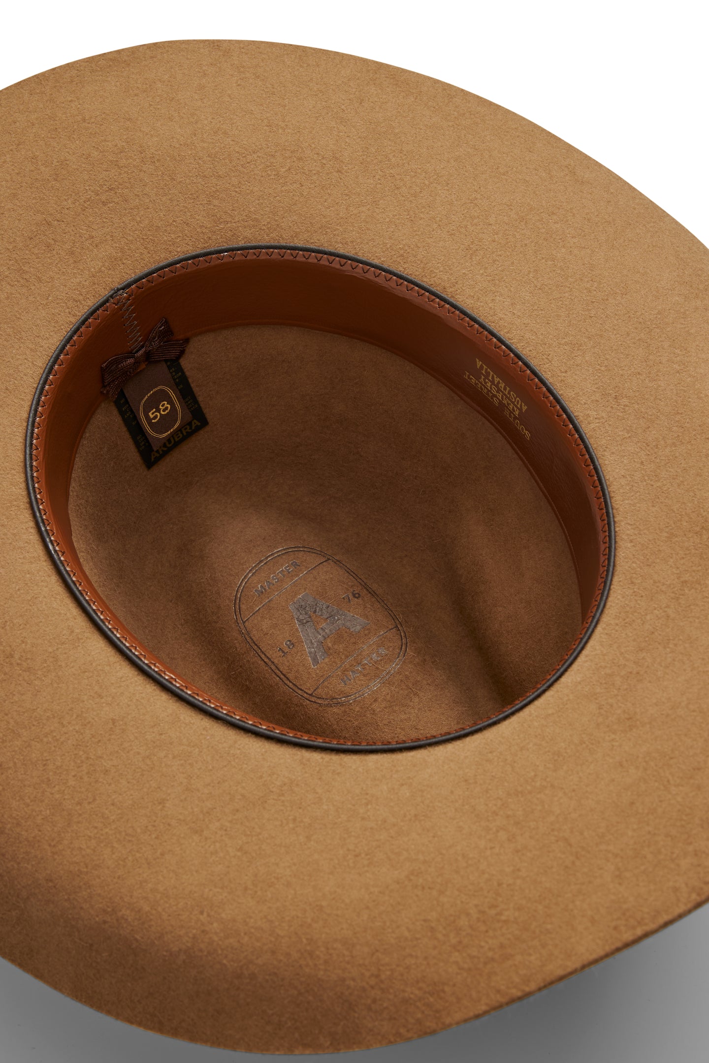 Akubra - Dusty Dawn Hat - Spice interior showing label and leather band detail.
