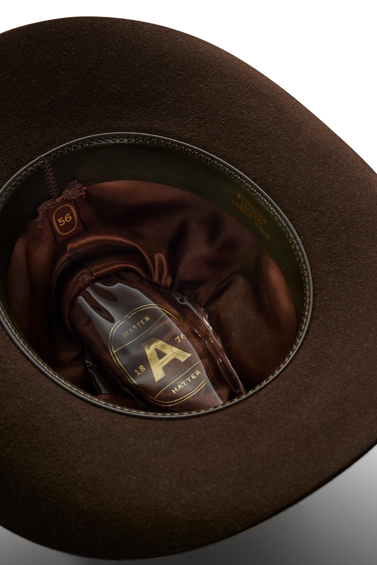 Akubra - My First Rodeo Hat - Bitter Chocolate interior view showing satin lining and leather details.