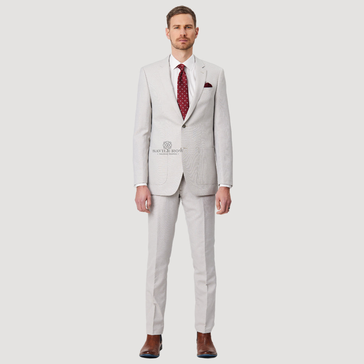 Savile Row - Asher SL3 Wool/Linen Blend Suit Jacket - Salt worn by a model, showcasing its tailored design and contemporary fit.