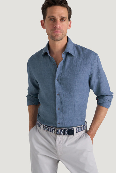 M.J. Bale - Bradfield Linen Shirt - Coastal Indigo - MULTIBUY worn by a man, featuring a casual fit and breathable linen fabric.