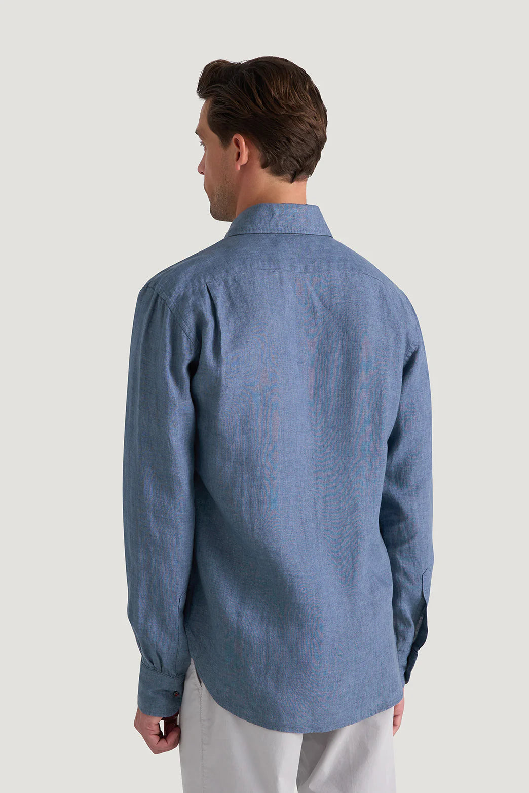 M.J. Bale - Bradfield Linen Shirt - Coastal Indigo - MULTIBUY displayed from the back.