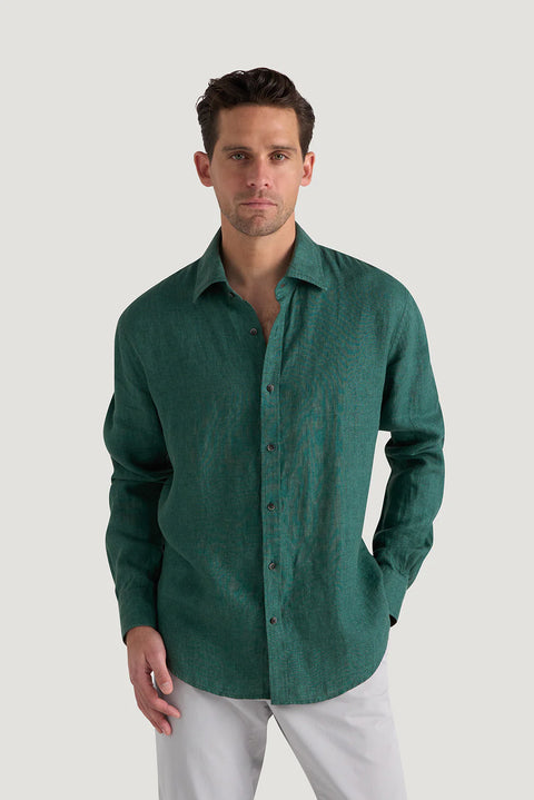 M.J. Bale - Bradfield Linen Shirt - Coastal Pine - MULTIBUY model wearing green linen shirt, showcasing its casual fit and texture.