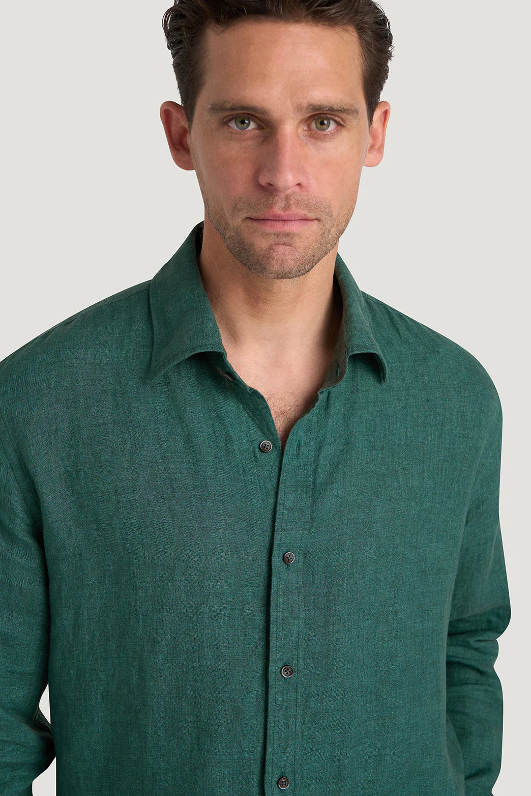 M.J. Bale - Bradfield Linen Shirt - Coastal Pine - MULTIBUY worn by a model, showcasing its casual fit and premium linen texture.