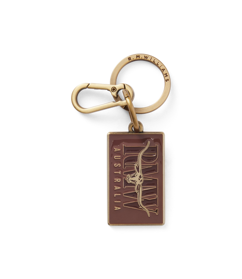 R.M.Williams - Heritage Logo Enamel Keyring - Chestnut with brass hardware and spring-loaded snap hook.