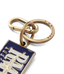 R.M.Williams - Heritage Logo Enamel Keyring - Navy featuring a gold clasp and logo detail.