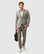 Rodd & Gunn - Cascades Jacket - Mink worn by a model, paired with casual trousers and carrying a bag.