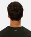 Industrie - The Del Sur Tee - Celtic - MULTIBUY worn by a model showcasing the back view of the tee.