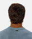Industrie - The Del Sur Tee - Dark Agean - MULTIBUY worn from the back, showcasing the relaxed fit and brand label.