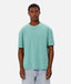 Industrie - The Del Sur Tee - Jade Marle - MULTIBUY worn by a model, showcasing its oversized fit in a light teal color.