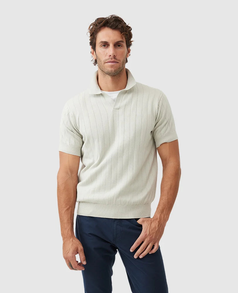 Rodd & Gunn - Freys Crescent Knit Polo - Stone worn by a man, showcasing its light fabric and ribbed details.