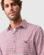 Rodd & Gunn - Gebbies Valley Linen Shirt - Check - Berry modeled by a man, featuring a red and white gingham pattern.