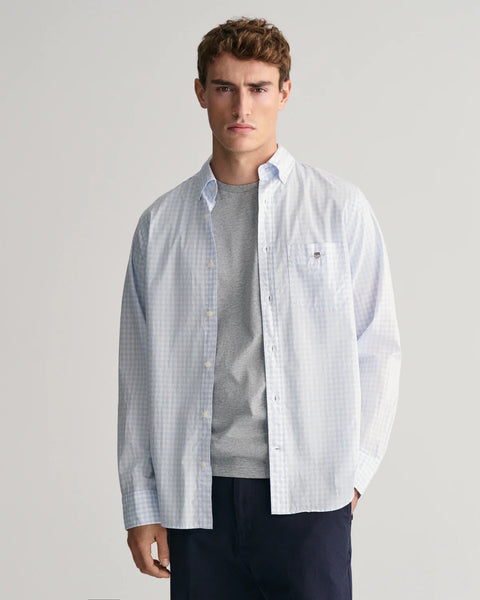 GANT - Poplin Shirt - Gingham - Light Blue & White displayed on a model wearing a casual outfit in a studio setting.