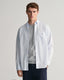 GANT - Poplin Shirt - Gingham - Light Blue & White displayed on a model wearing a casual outfit in a studio setting.