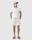 Rodd & Gunn - Gunn 7" Resort Short - Coconut - MULTIBUY model wearing casual outfit with cap and sandals.