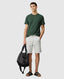 Rodd & Gunn - The Gunn T-Shirt 2.0 - Hunter Green - MULTIBUY, model wearing green t-shirt, styled with shorts and bag.