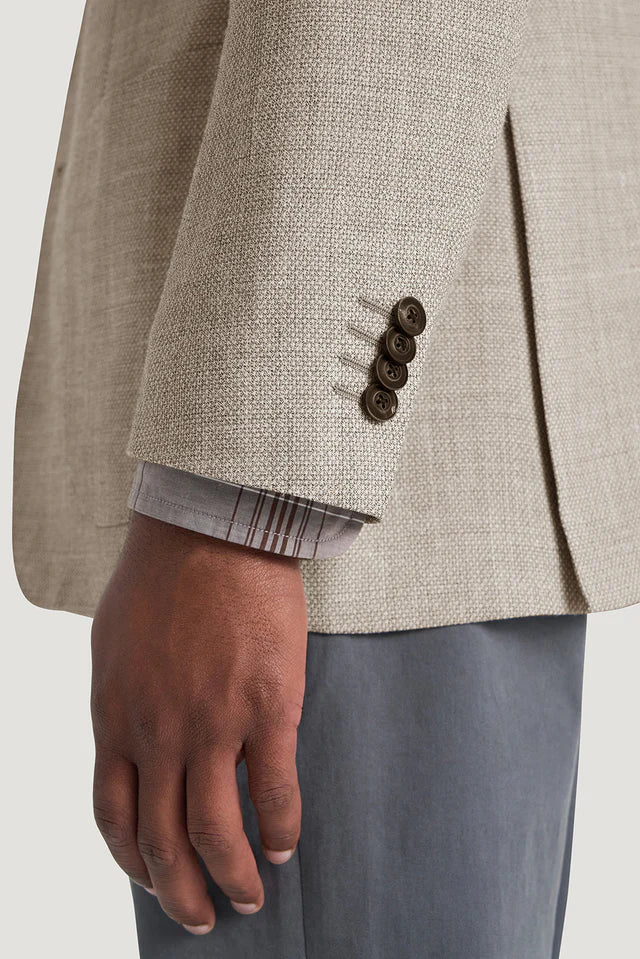 M.J.Bale - Hailwood Jacket - Light Brown detail showing textured fabric and buttoned cuff.