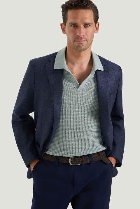 M.J. Bale - Hannigan Jacket - Navy worn by a model with a light blue shirt and navy trousers.