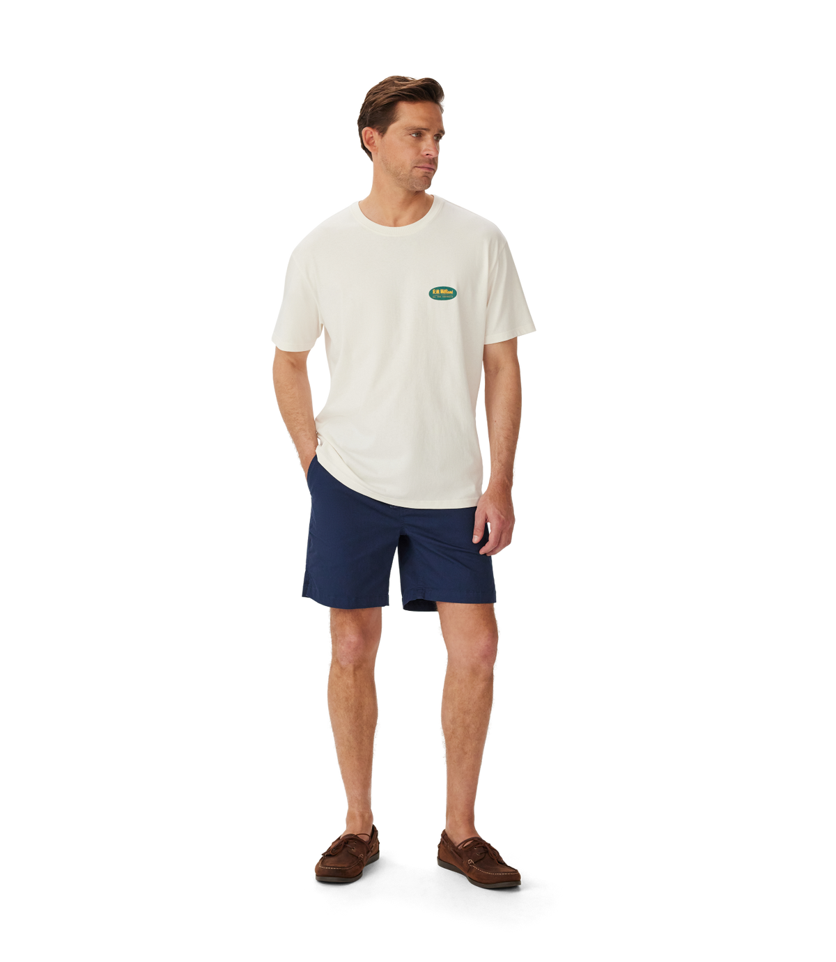 R.M.Williams - 90s Logo T-Shirt - White - NEED DESCRIPTION, model wearing white t-shirt and shorts.