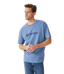 R.M.Williams - Outfitter T-Shirt - Soft Blue worn by a model, showcasing the crew neck and branded print.