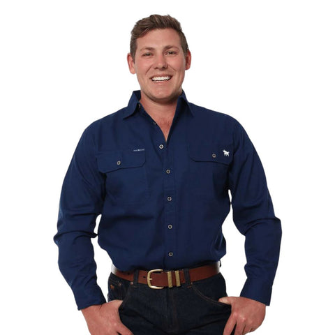 Ringers Western - King River Work Shirt - Navy worn by a man, showcasing its full-button front and double breast pockets.