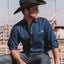 Ringers Western - King River Work Shirt - Navy worn by a model with a cowboy hat, showcasing its style and functionality.