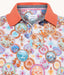 A Fish Named Fred - Desert World Polo - Orange featuring a vibrant desert landscape print and contrast collar.