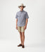 R.M.Williams - Hervey Shirt - Short Sleeve - Check - Navy & White worn by a model with beige shorts and a hat.