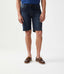 R.M.Williams - Nicholson Denim Short - Indigo worn by a model, showing knee-length fit and stylish look.