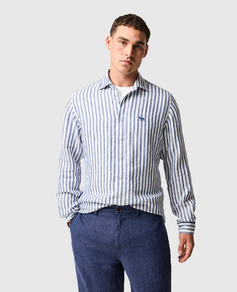 Rodd & Gunn - Seadown Linen Shirt - Stripe - French Navy worn by a model, showcasing vertical stripes on a white base.
