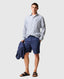 Rodd & Gunn - Seadown Linen Shirt - Stripe - French Navy displayed on model with shorts and sandals.