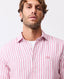 Rodd & Gunn - Seadown Linen Shirt - Stripe - Rosewater worn by model, featuring vertical stripes and a modern fit.