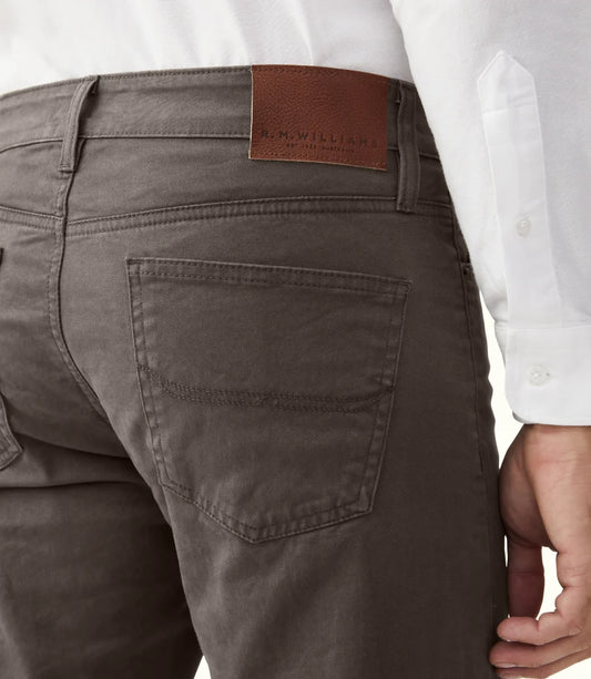 R.M.Williams - Loxton 5 Pocket Jean - Silt featuring the branded leather waist badge and back pockets.