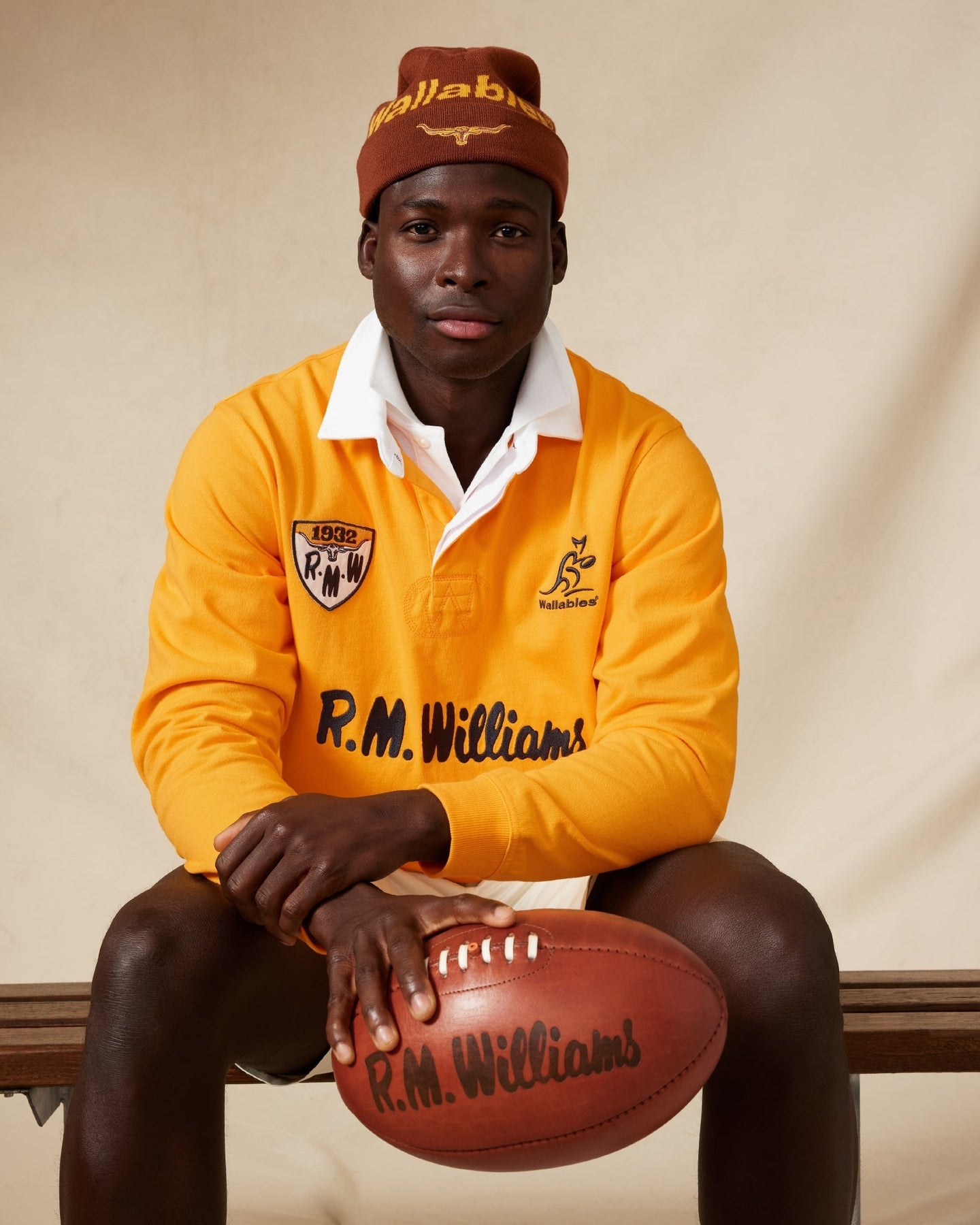 The History and Style of Men’s Rugby Jumpers: A Must-Have for Winter featuring a model in a vibrant rugby jumper.