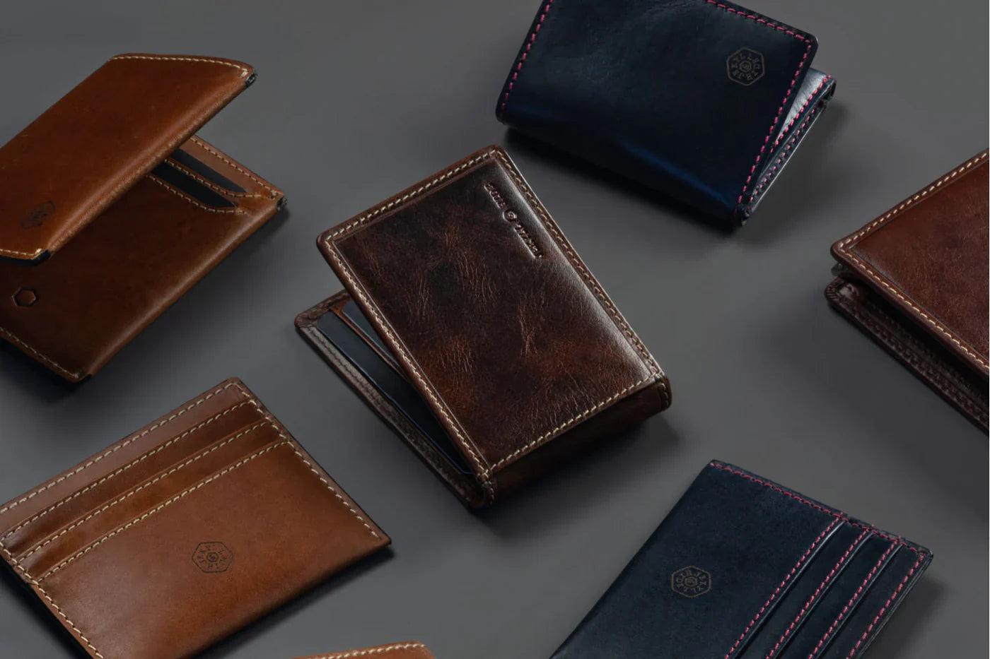 Jekyll and Hide - Leather Money Clip Wallet - Mocha | Black | Camo Black | Tan displayed among various leather wallets.