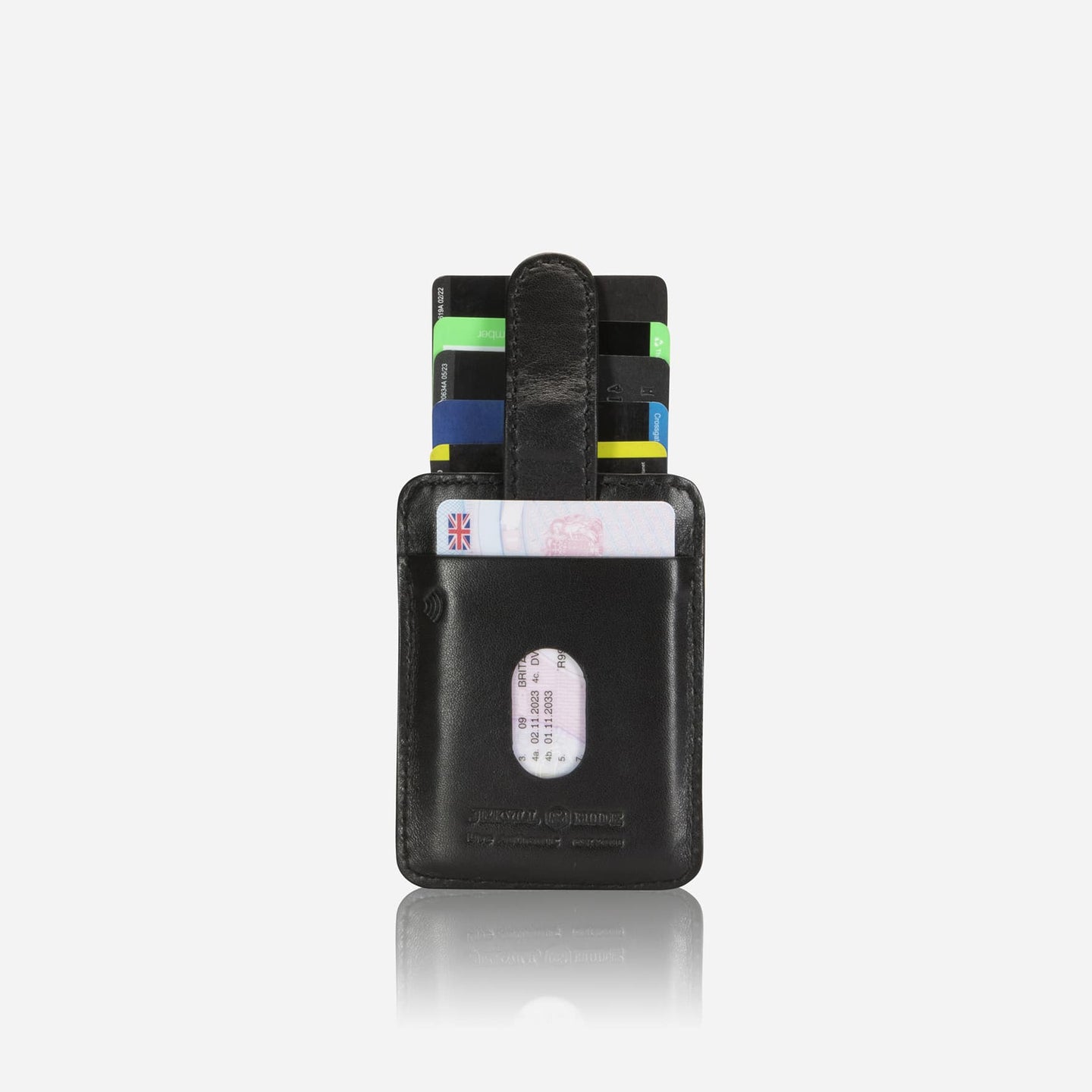 Jekyll and Hide - Compact Tab Card Holder - Black | Mocha | Tan with credit cards and bills shown.