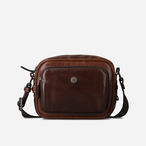 Jekyll and Hide - Small Travel Crossbody Bag - Mocha shown in durable leather, featuring minimalist design and adjustable strap.
