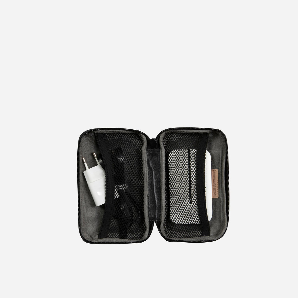 Jekyll and Hide - Compact Zip Around Cable Pouch - Tan | Black | Mocha with tech accessories organized inside.