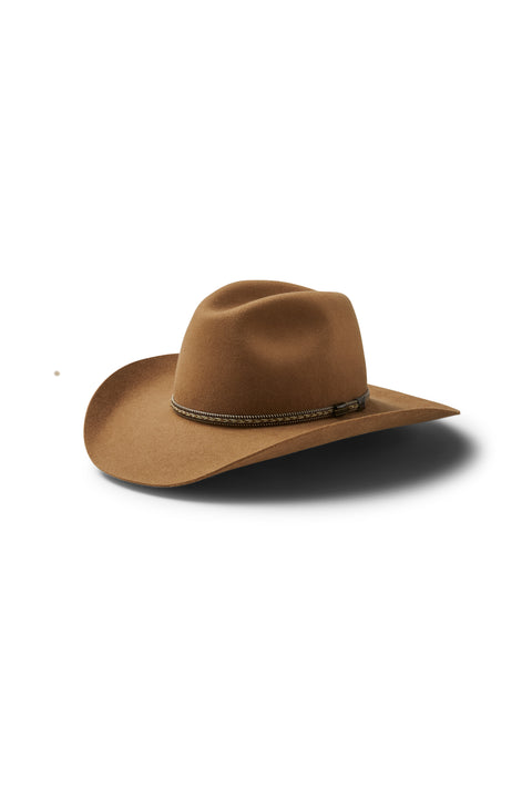 Akubra - Dusty Dawn Hat - Spice displayed at an angle, showcasing its Western-style crown and wide brim.