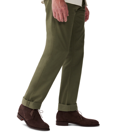 R.M.Williams - Kingscliff Boot - Suede - Dark Brown worn with olive green trousers, showcasing versatile style.